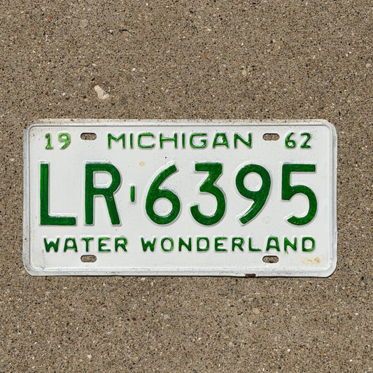Photo of a 1962 Michigan License Plate Auto Tag Garage Decor Vintage LR 6395 with original patina