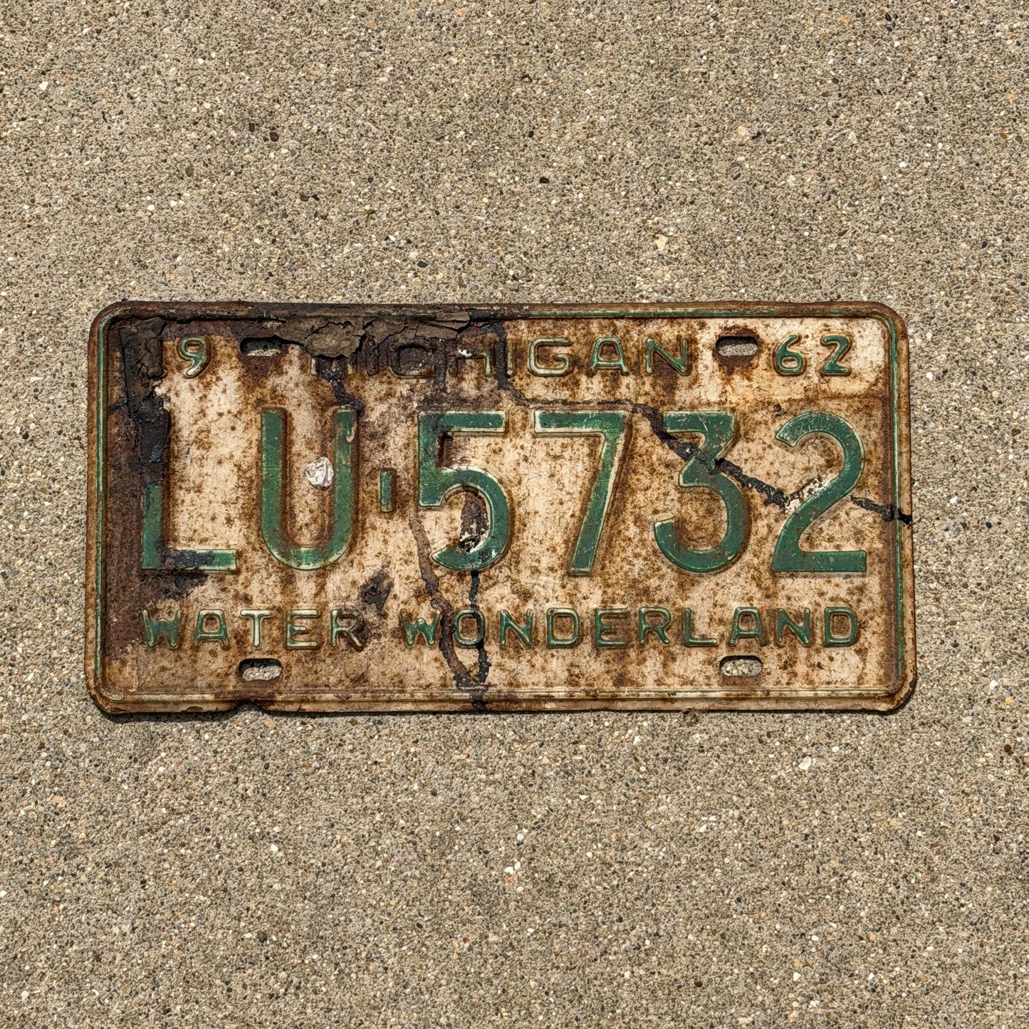 Photo of a 1962 Michigan License Plate Auto Tag Garage Decor Vintage LU 5732 with original patina