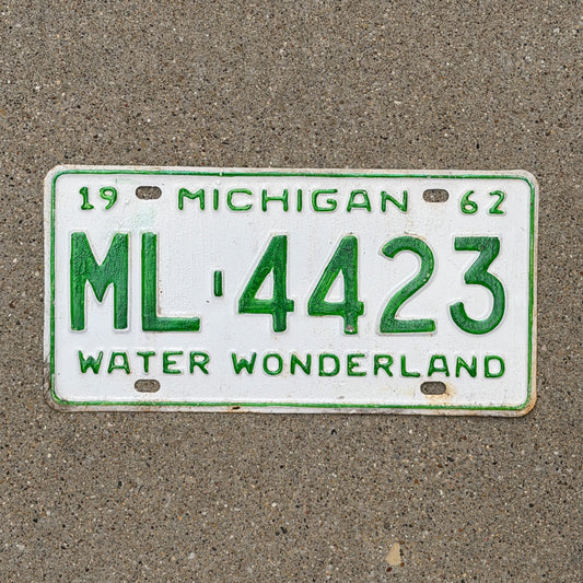 Photo of a 1962 Michigan License Plate Auto Tag Garage Decor Vintage ML 4423 with original patina
