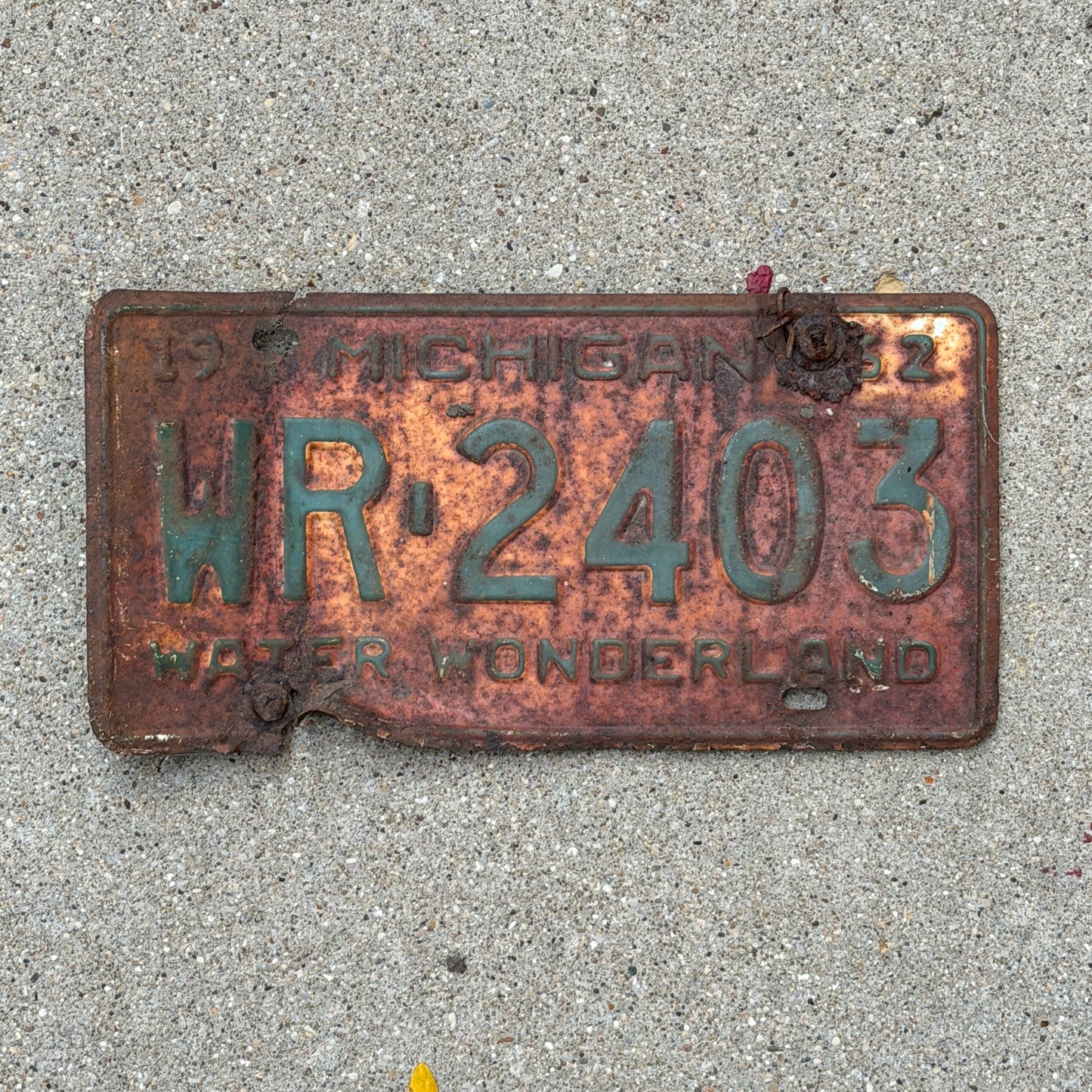 Photo of a 1962 Michigan License Plate Auto Tag Garage Decor Vintage WR 2403 with original patina