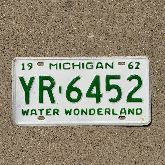 Photo of a 1962 Michigan License Plate Auto Tag Garage Decor Vintage YR 6452 with original patina