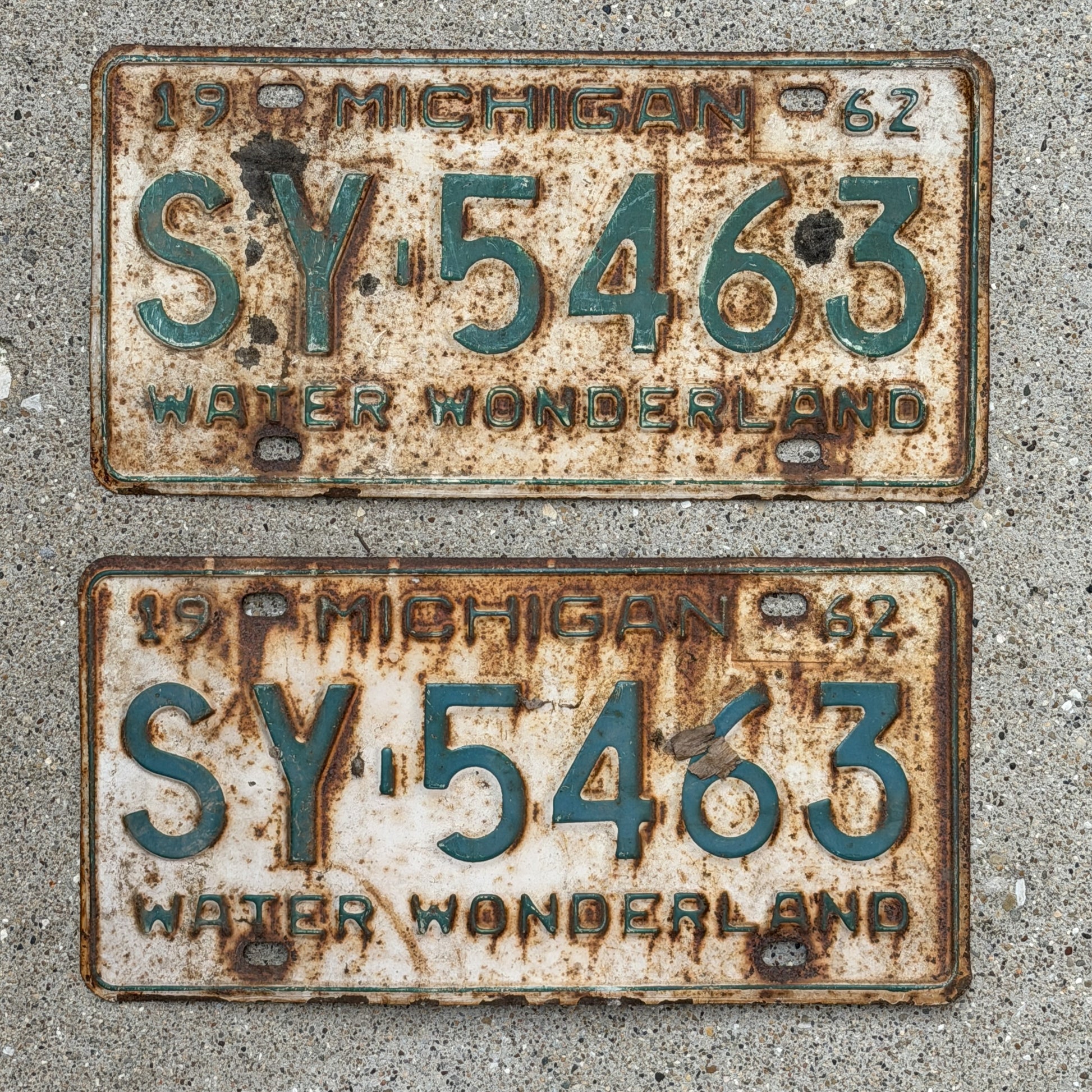 Photo of a 1962 Michigan License Plate Pair Auto Tag Garage Decor Vintage SY 5463 with original patina