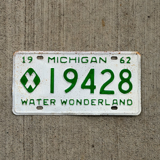Photo of a 1962 Michigan Municipal License Plate Auto Tag Garage Decor Vintage 19428 with original patina