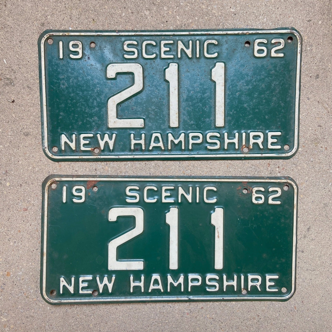 Photo of a 1962 New Hampshire License Plate Pair Auto Tag Garage Decor Vintage Low Number Three Digit 211 with original patina