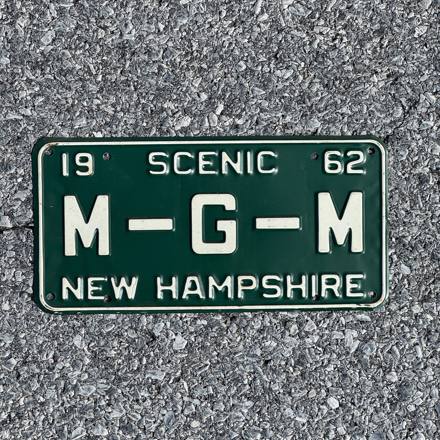 Photo of a 1962 New Hampshire Vanity License Plate Auto Tag Garage Decor Vintage Las Vegas Gambling M G M