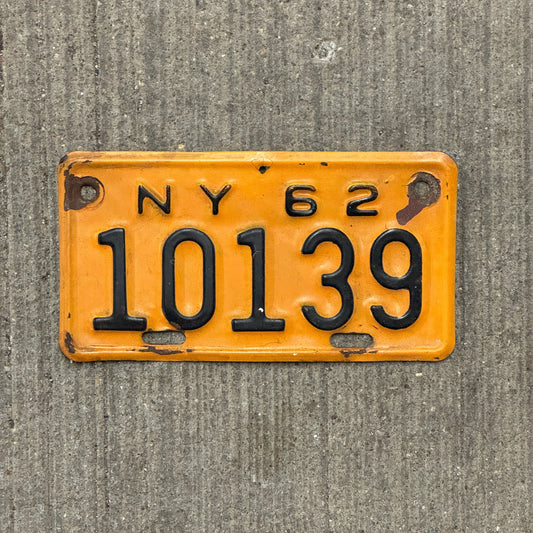 Photo of a 1962 New York Motorcycle License Plate Auto Tag Garage Decor Vintage 10139 with original patina