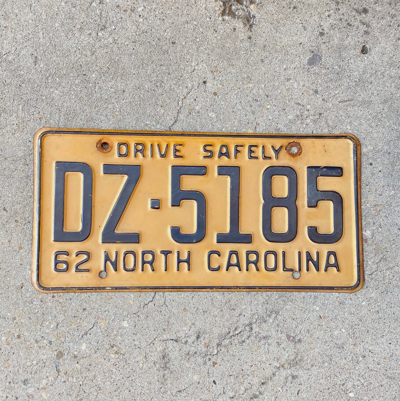 Photo of a 1962 North Carolina License Plate Auto Tag Garage Decor Vintage DZ 5185 with original patina