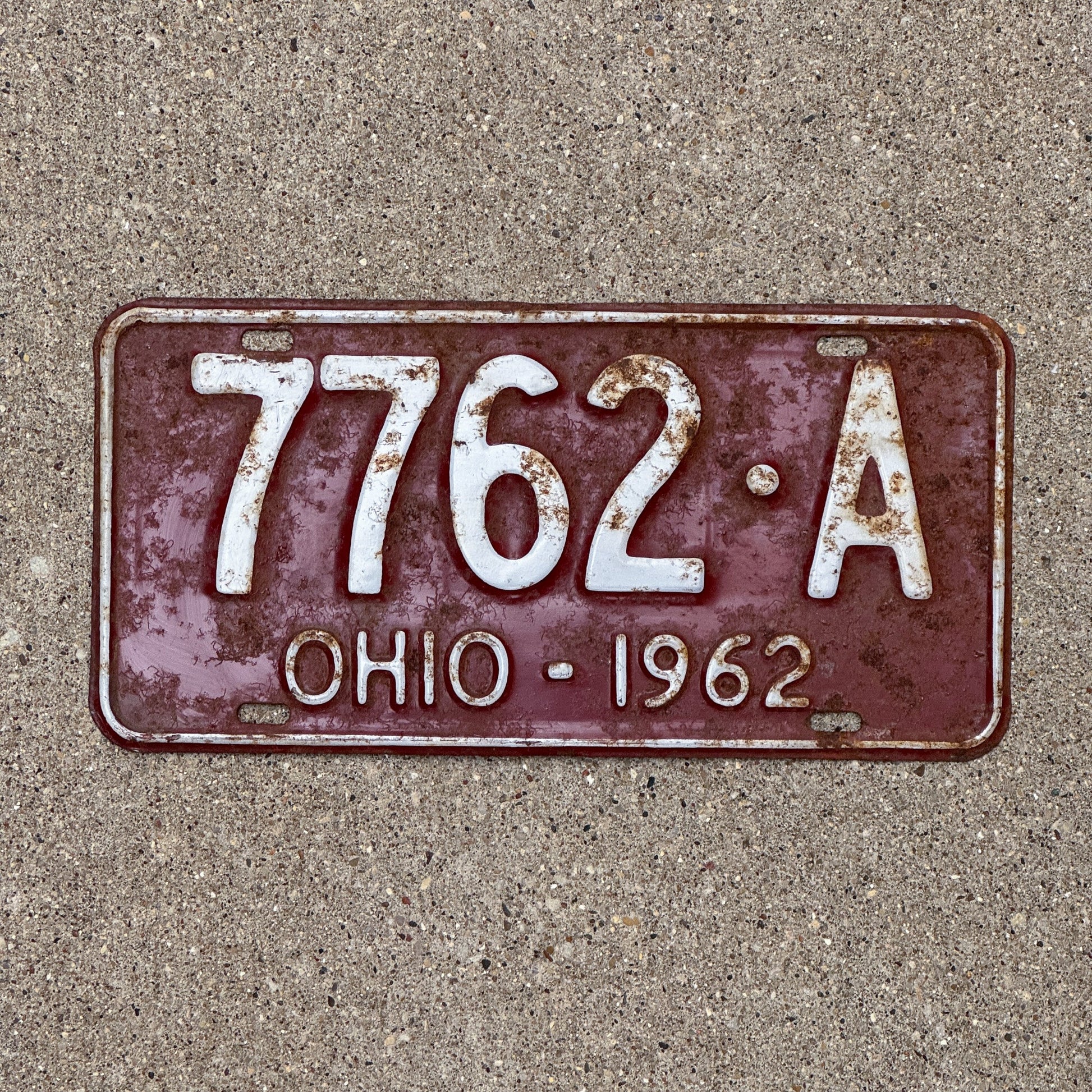 Photo of a 1962 Ohio License Plate Auto Tag Garage Decor Vintage 7762 A with original patina