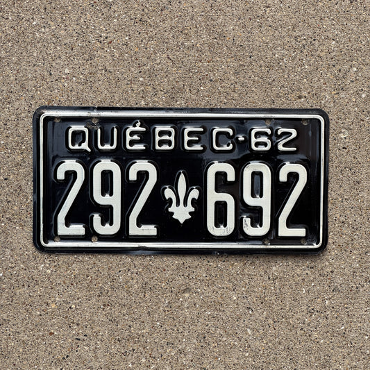 Photo of a 1962 Quebec License Plate Auto Tag Garage Decor Vintage 292 692 with original patina