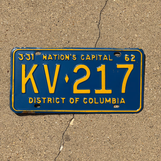 Photo of a 1962 Washington DC License Plate Auto Tag Garage Decor Vintage Blue Yellow KV 217