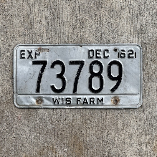 Photo of a 1962 Wisconsin Farm License Plate Auto Tag 1 Vintage Garage 73789 with original patina