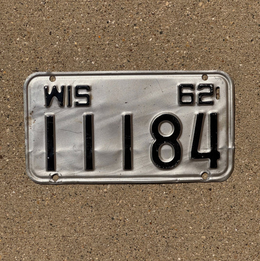 Photo of a 1962 Wisconsin Motorcycle License Plate Auto Tag Garage Decor Vintage Repeat Repeating 11184 with original patina