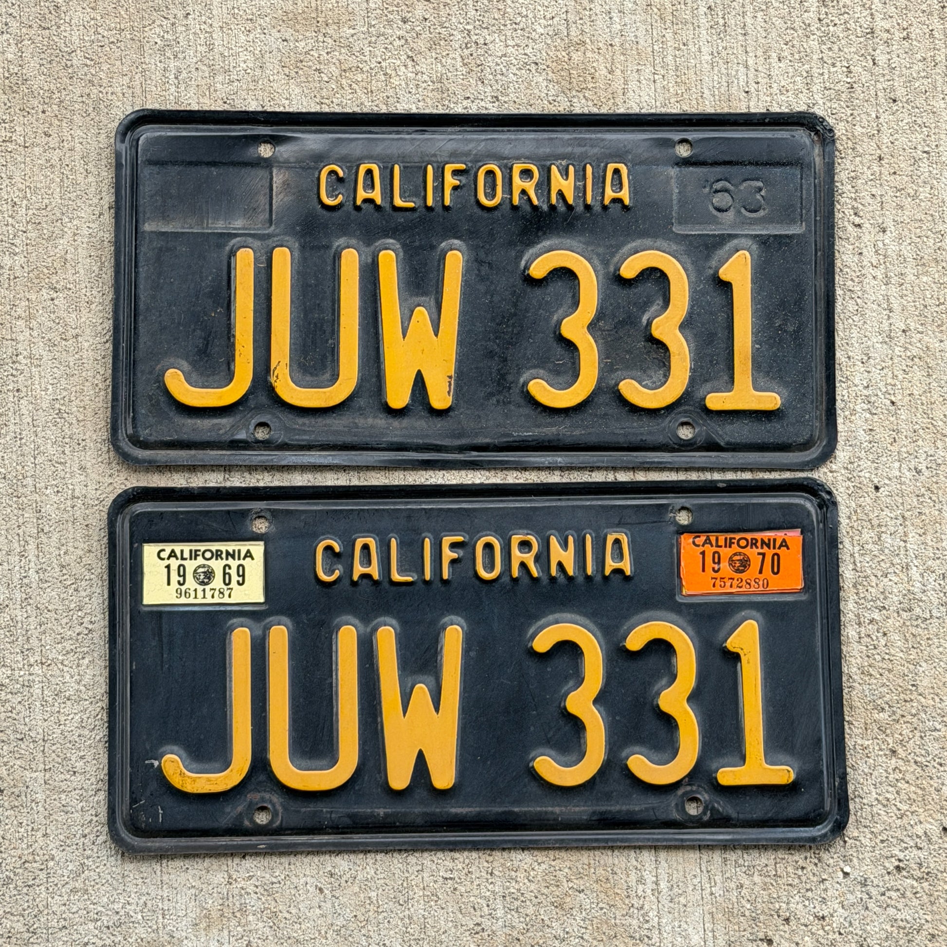 Photo of a 1963 1970 California License Plate Pair Auto Tag Garage Decor Vintage JUW 331 with original patina