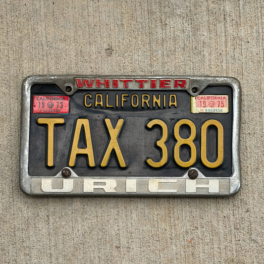 Photo of a 1963 1975 California License Plate Auto Tag Garage Decor Vintage Accountant Accounting Gift with Whittier Urich Frame TAX 380 with original patina