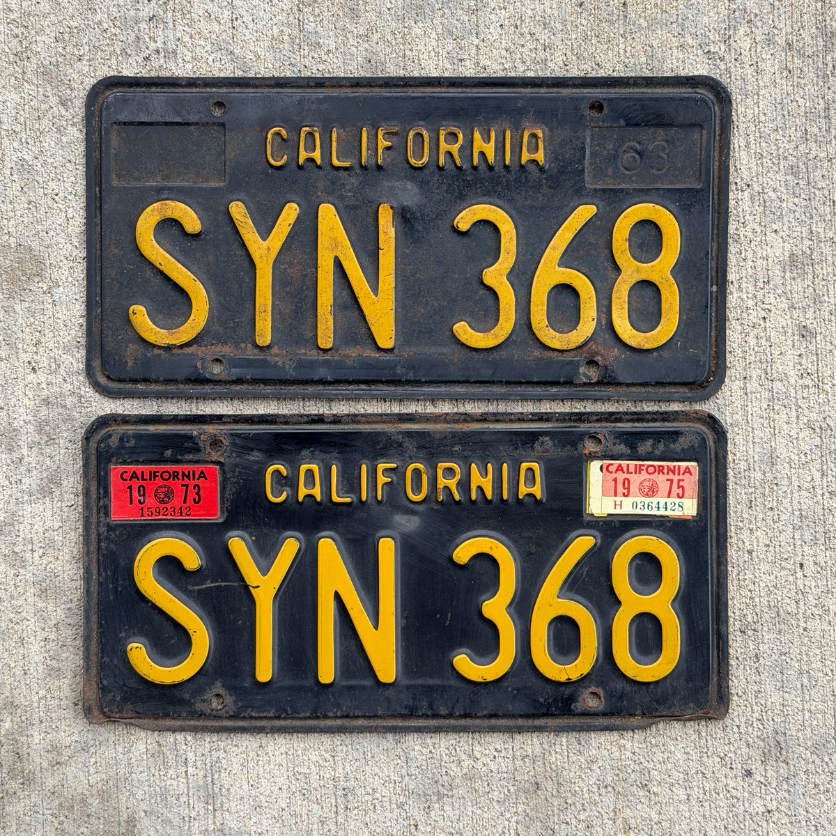 Photo of a 1963 1975 California License Plate Pair Auto Tag Garage Decor Vintage DMV Clear Number SYN 368 with original patina