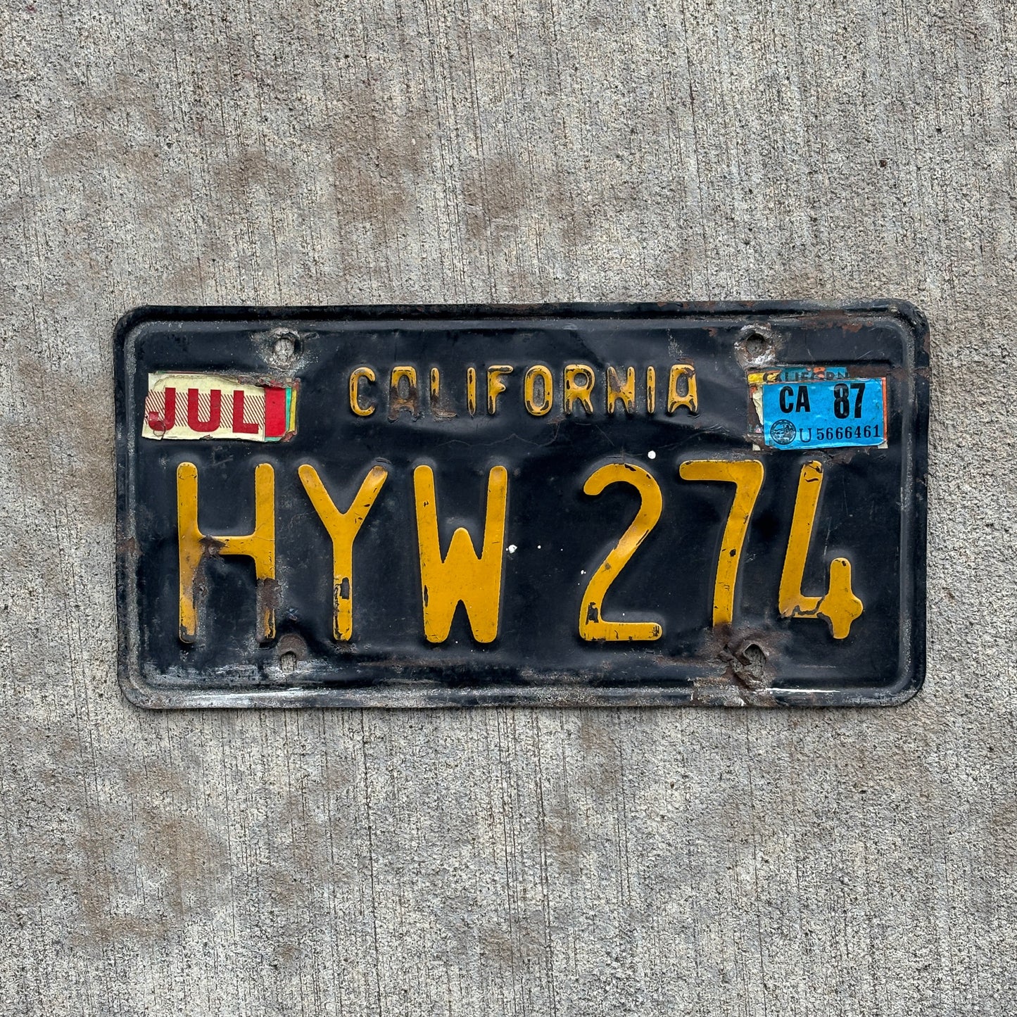 Photo of a 1963 1987 California License Plate Auto Tag Garage Decor Vintage HYW 274 with original patina