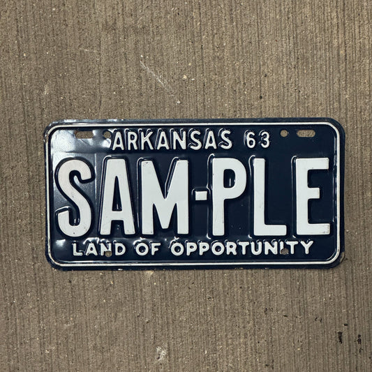 Photo of a 1963 Arkansas SAMPLE License Plate Auto Tag Garage Decor Vintage SAMPLE