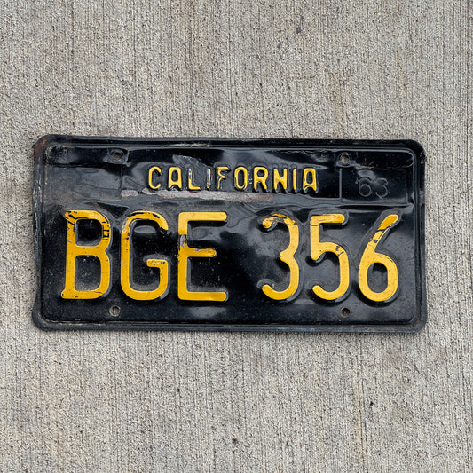 Photo of a 1963 California License Plate Auto Tag Garage Decor Vintage BGE 356 with original patina