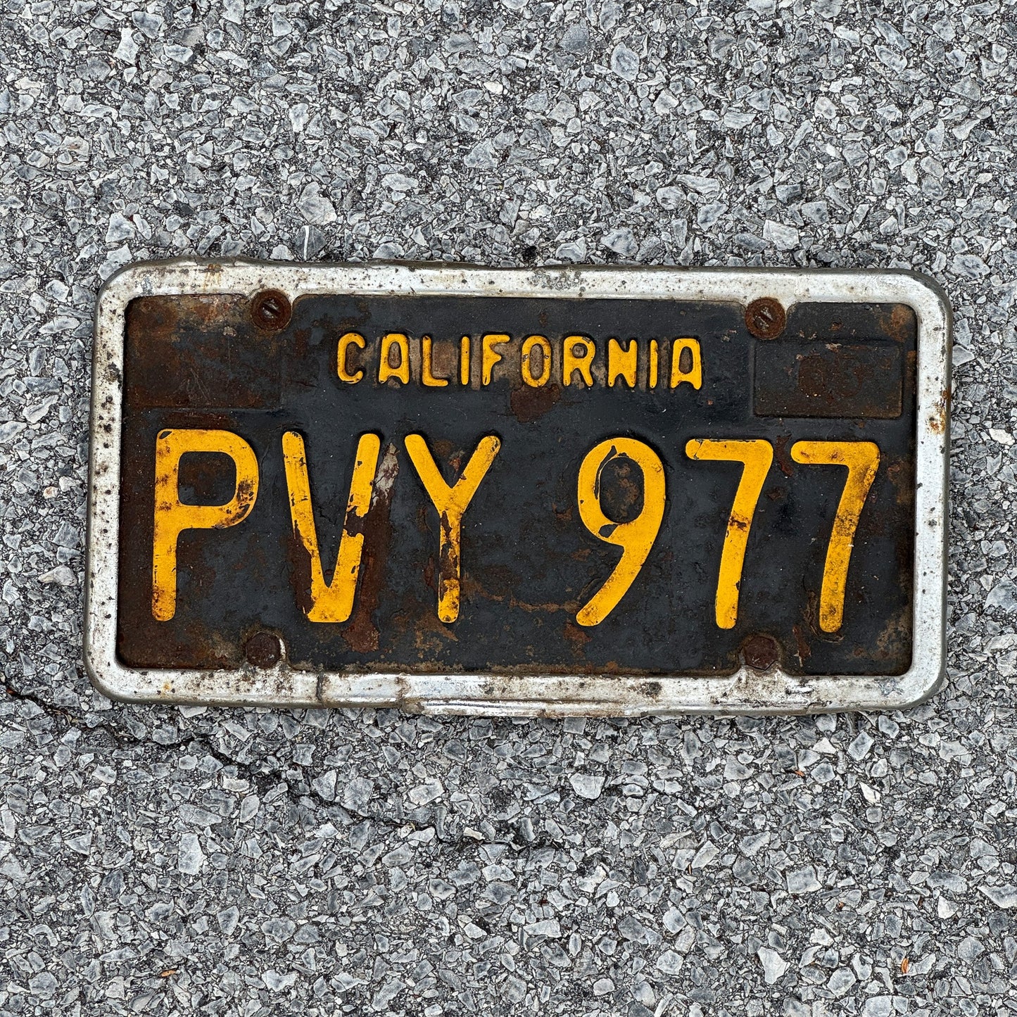 Photo of a 1963 California License Plate Auto Tag Garage Decor Vintage with Frame PVY 977