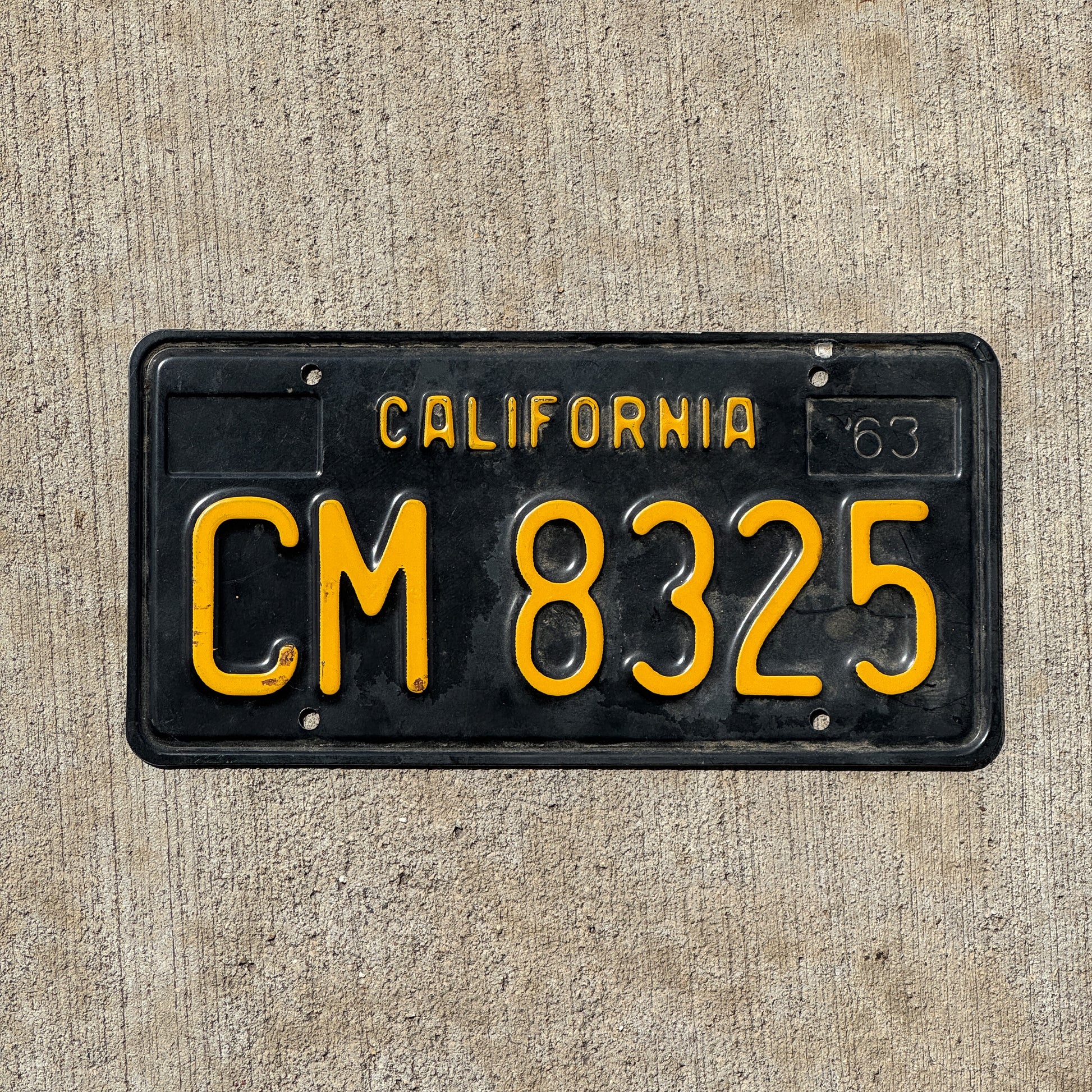 Photo of a 1963 California Trailer License Plate Auto Tag Garage Decor Vintage CM 8325 with original patina
