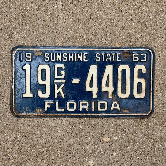 Photo of a 1963 Florida Commercial License Plate Auto Tag Garage Decor Vintage 19 GK 4406 with original patina