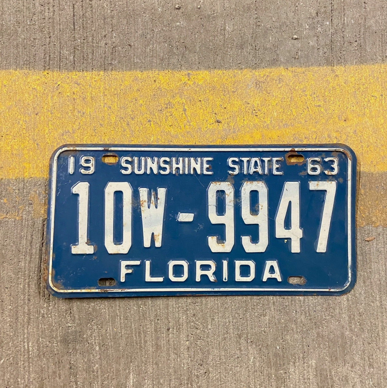Photo of a 1963 Florida License Plate Auto Tag Garage Decor Vintage 10 W 9947 with original patina
