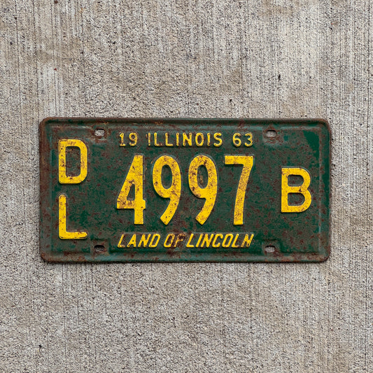 Photo of a 1963 Illinois Dealer License Plate Auto Tag 1 Vintage Garage 4997 B with original patina
