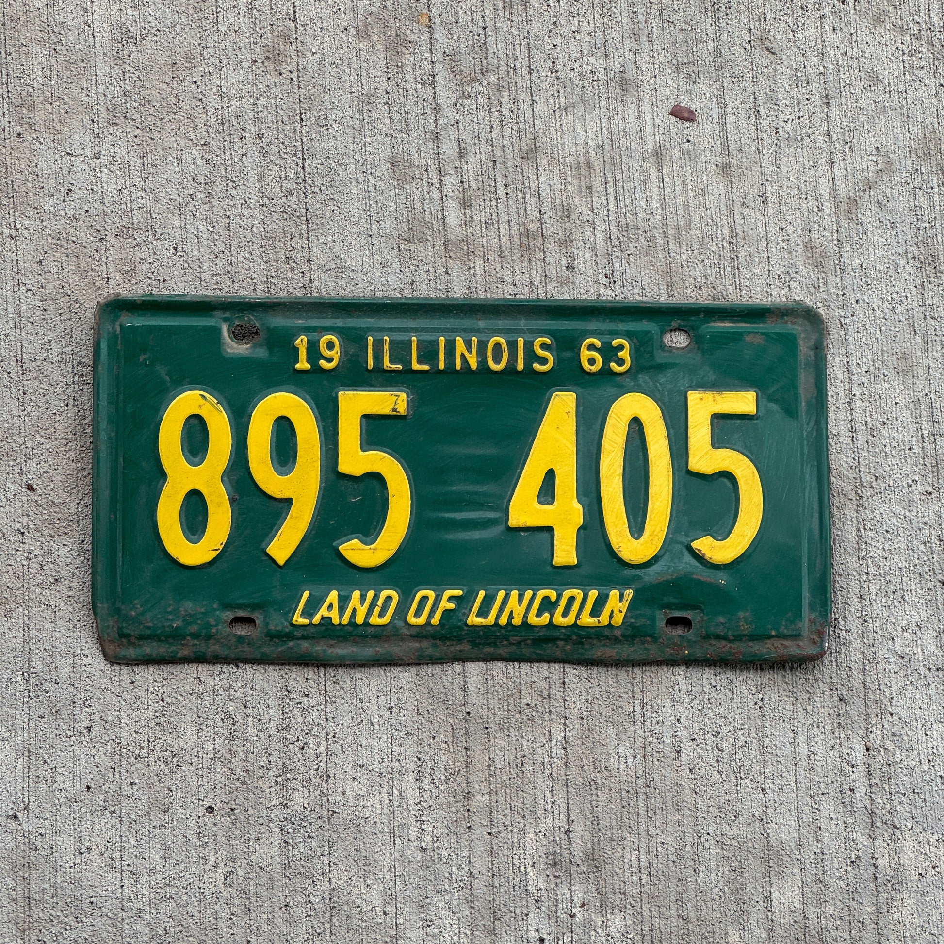 Photo of a 1963 Illinois License Plate Auto Tag 2 Vintage Garage 895 405 with original patina
