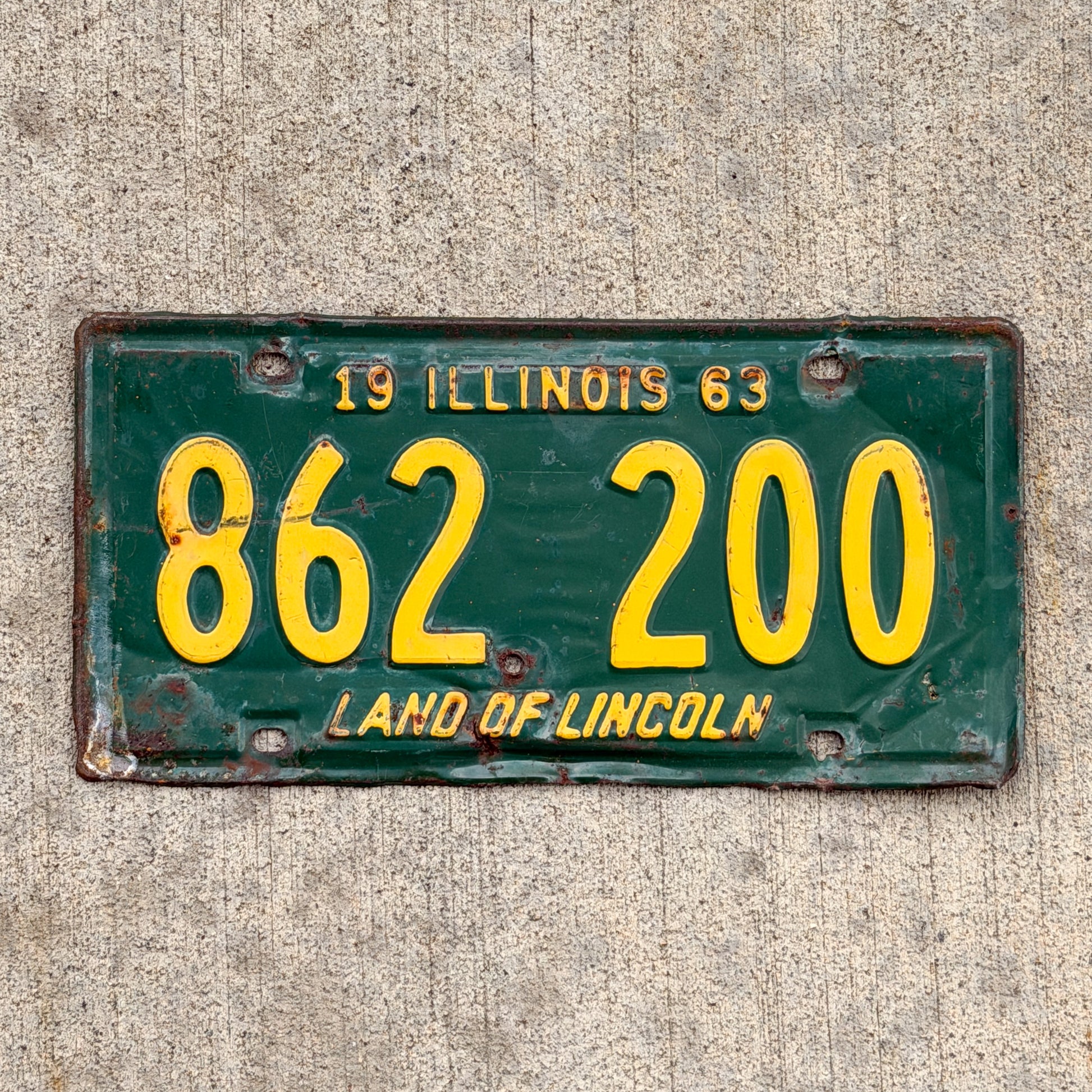 Photo of a 1963 Illinois License Plate Auto Tag Garage Decor Vintage 862 200 with original patina
