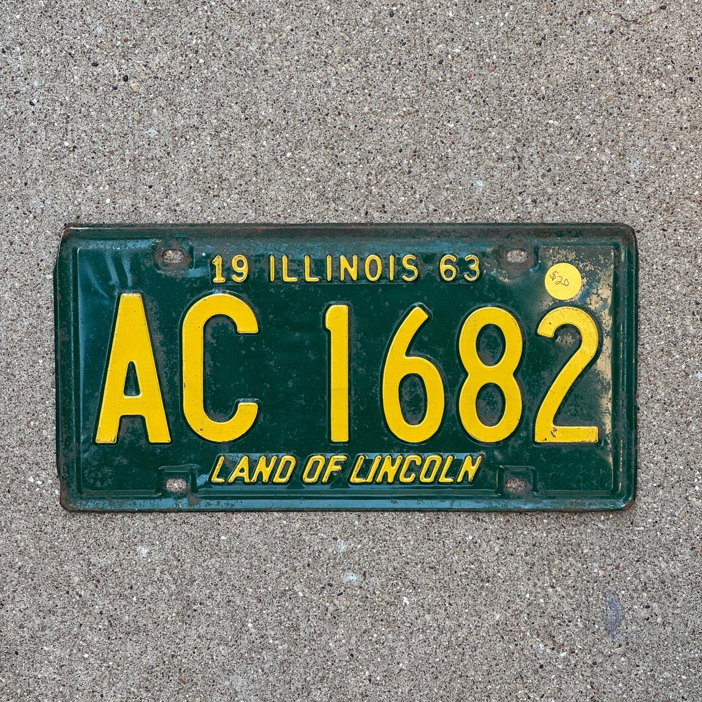 Photo of a 1963 Illinois License Plate Auto Tag Garage Decor Vintage AC 1682 with original patina