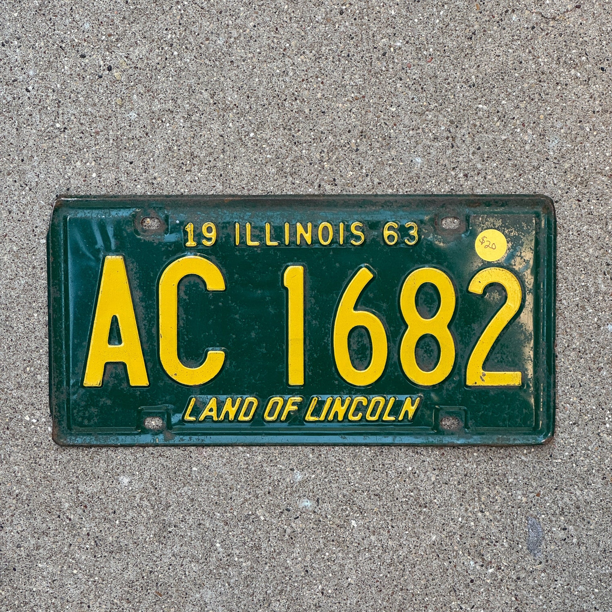 Photo of a 1963 Illinois License Plate Auto Tag Garage Decor Vintage AC 1682 with original patina