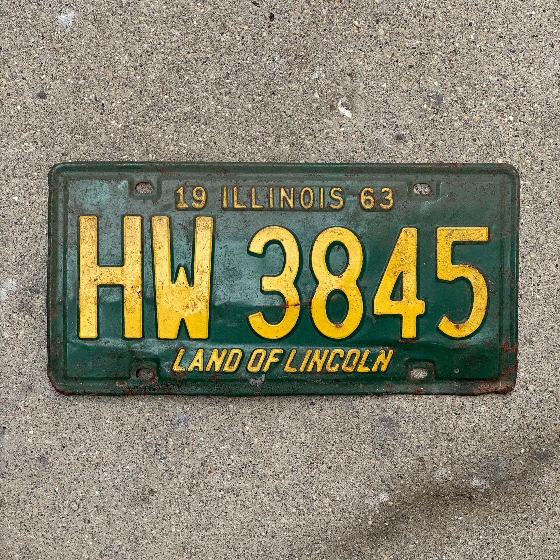 Photo of a 1963 Illinois License Plate Auto Tag Garage Decor Vintage HW 3845 with original patina