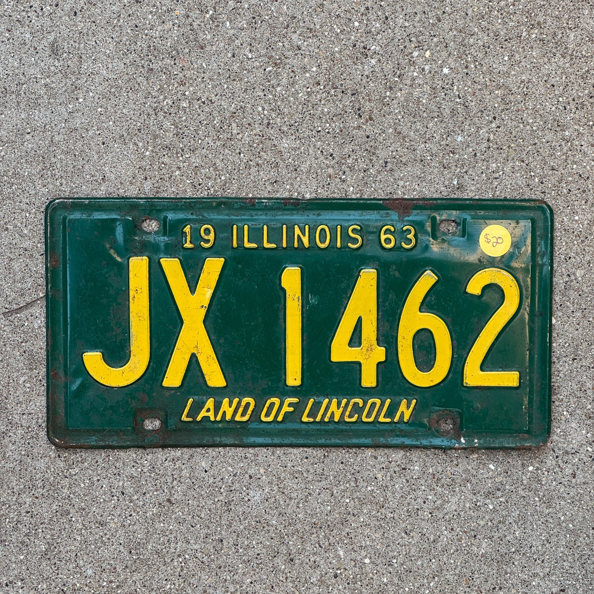 Photo of a 1963 Illinois License Plate Auto Tag Garage Decor Vintage JX 1462 with original patina