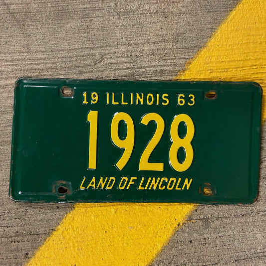 Photo of a 1963 Illinois License Plate Auto Tag Garage Decor Vintage Low Number Four Digit 1928 with original patina
