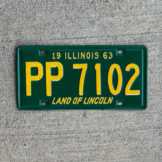 Photo of a 1963 Illinois License Plate Auto Tag Garage Decor Vintage PP 7102 with original patina