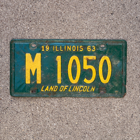 Photo of a 1963 Illinois Municipal License Plate Auto Tag 1 Vintage Garage M 1050 with original patina