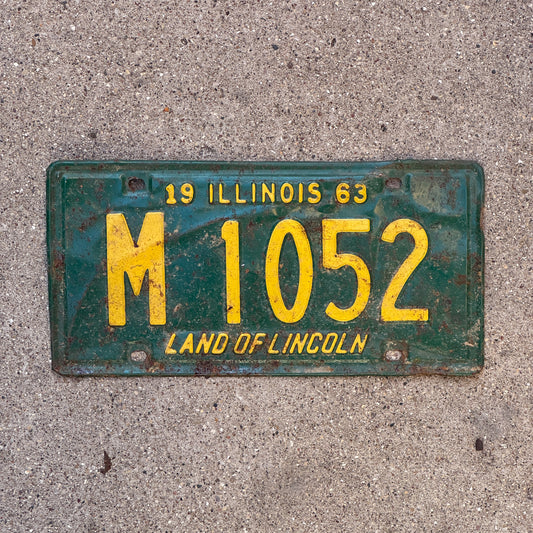 Photo of a 1963 Illinois Municipal License Plate Auto Tag 1 Vintage Garage M 1052 with original patina