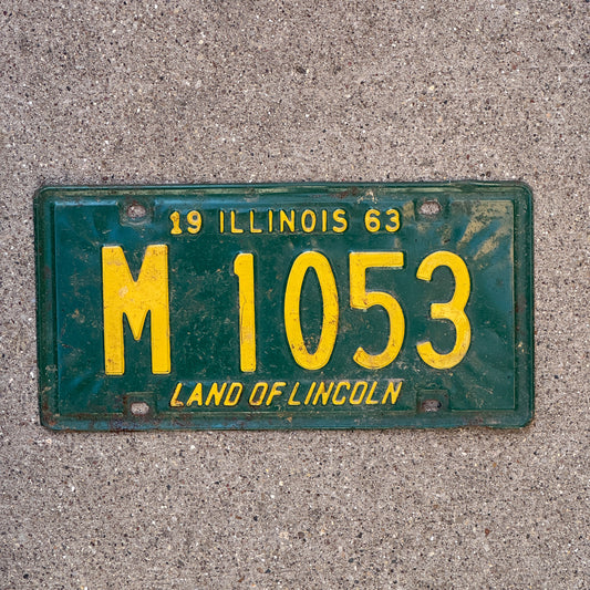 Photo of a 1963 Illinois Municipal License Plate Auto Tag 1 Vintage Garage M 1053 with original patina
