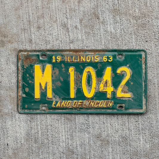 Photo of a 1963 Illinois Municipal License Plate Auto Tag 2 Vintage Garage M 1042 with original patina