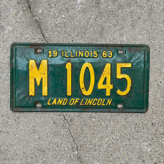Photo of a 1963 Illinois Municipal License Plate Auto Tag 2 Vintage Garage M 1045 with original patina