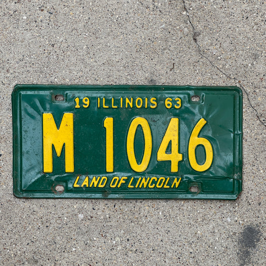 Photo of a 1963 Illinois Municipal License Plate Auto Tag 2 Vintage Garage M 1046 with original patina