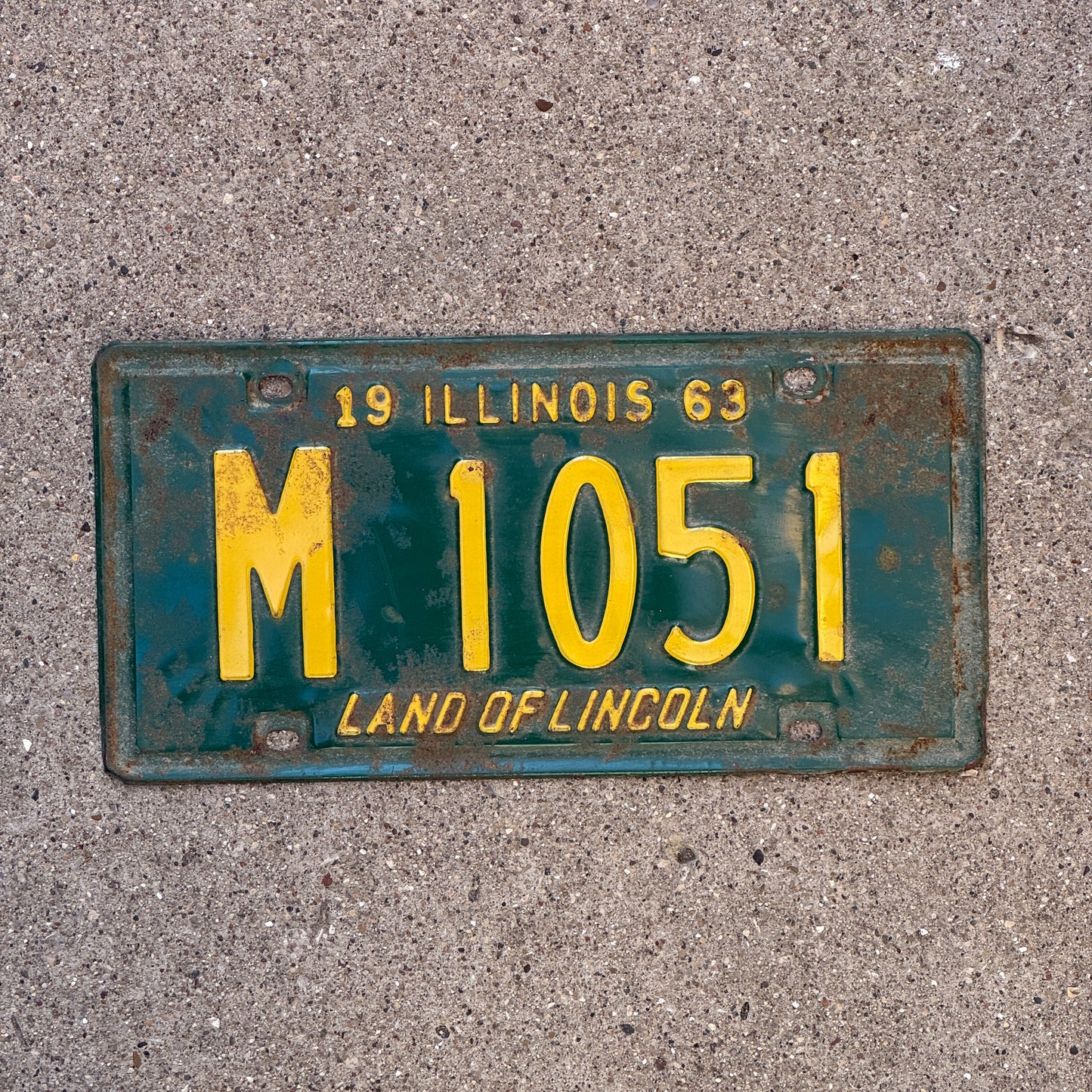 Photo of a 1963 Illinois Municipal License Plate Auto Tag 2 Vintage Garage M 1051 with original patina