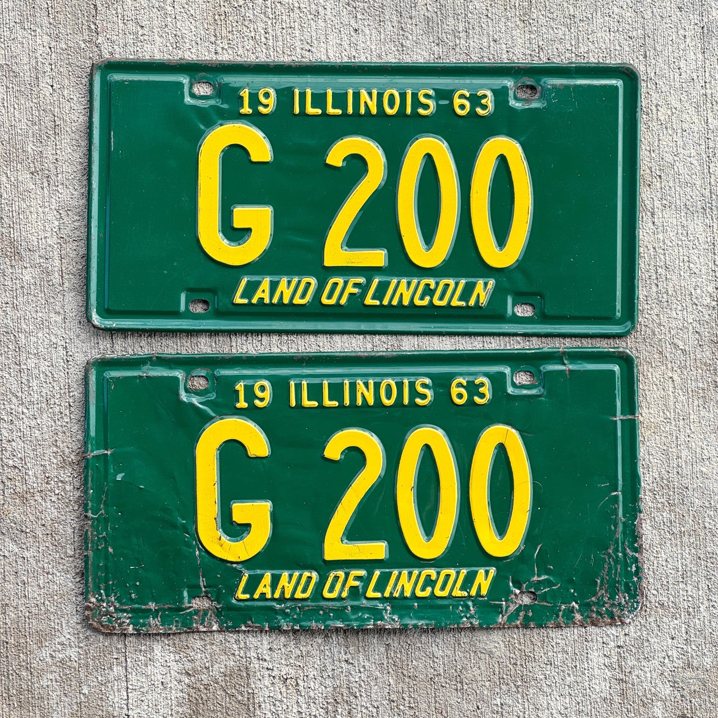 Photo of a 1963 Illinois Truck License Plate Pair Auto Tag Garage Decor Vintage Low Number Three Digit G 200 with original patina