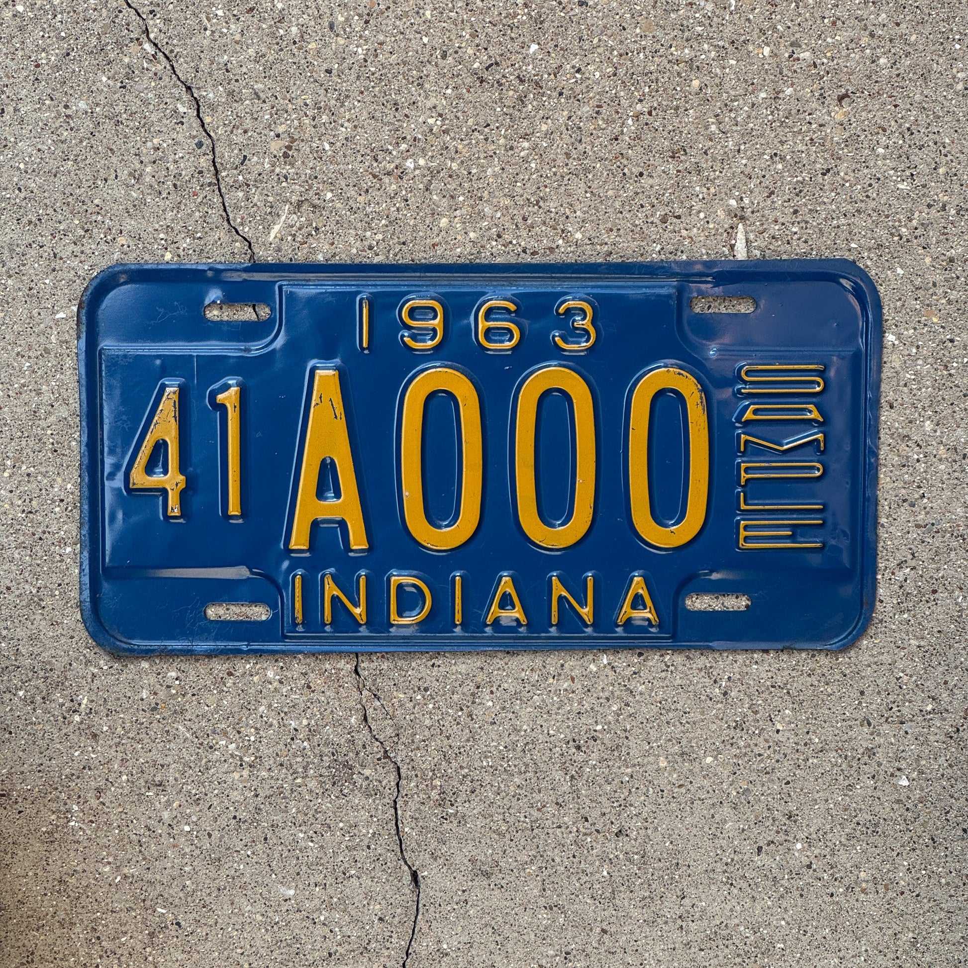 Photo of a 1963 Indiana Sample License Plate Auto Tag Garage Decor Vintage 41A000 with original patina