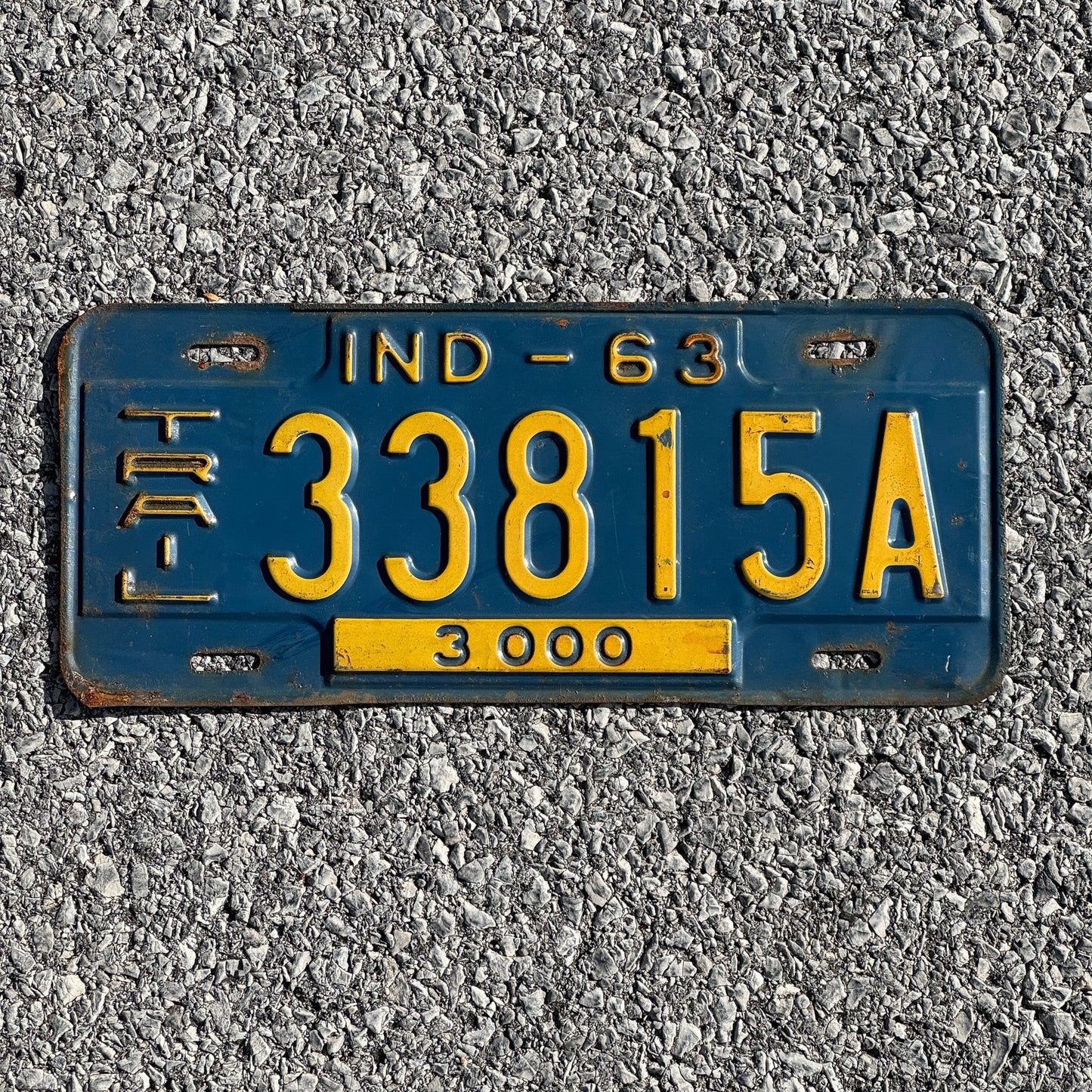 Photo of a 1963 Indiana Trailer License Plate Auto Tag Garage Decor Vintage 33815A