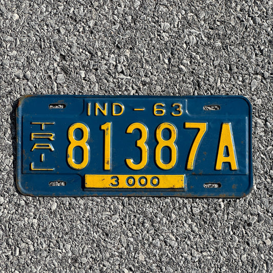 Photo of a 1963 Indiana Trailer License Plate Auto Tag Garage Decor Vintage 81387A