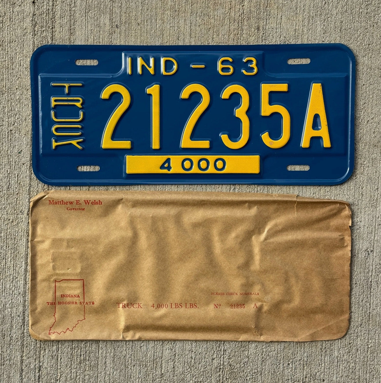 Photo of a 1963 Indiana Truck License Plate Auto Tag Garage Decor Vintage 21235 A with original patina