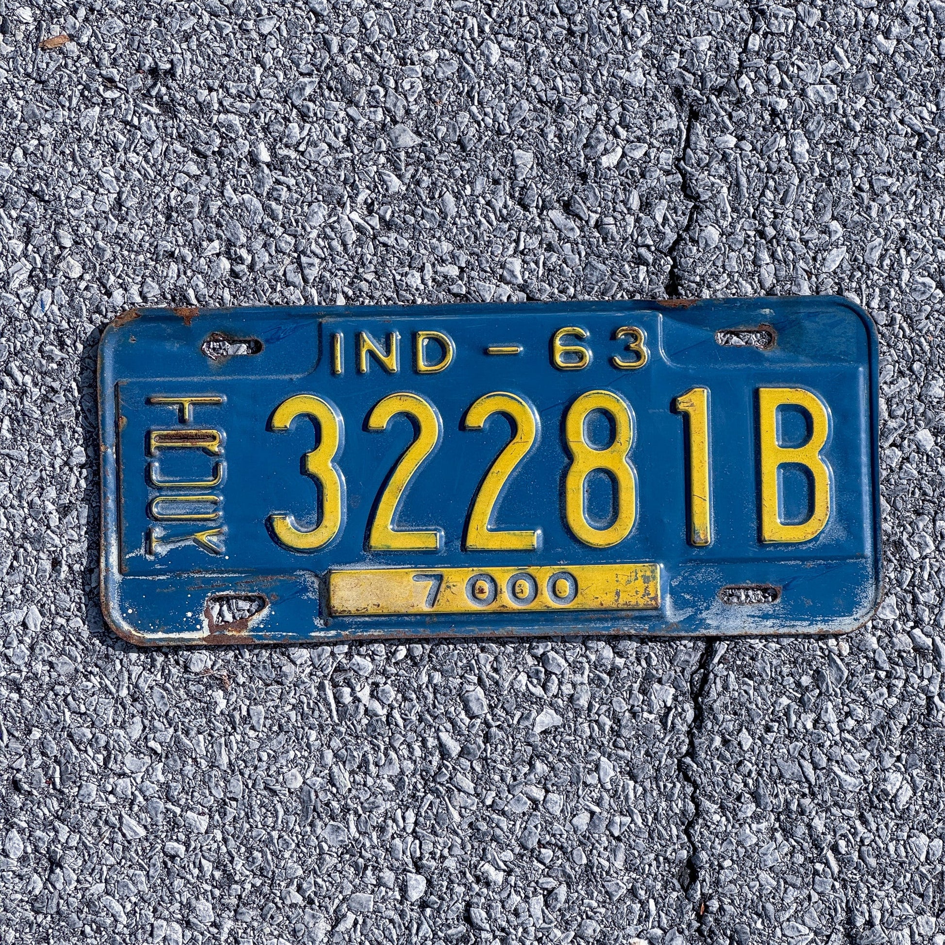 Photo of a 1963 Indiana Truck License Plate Auto Tag Garage Decor Vintage 32281B