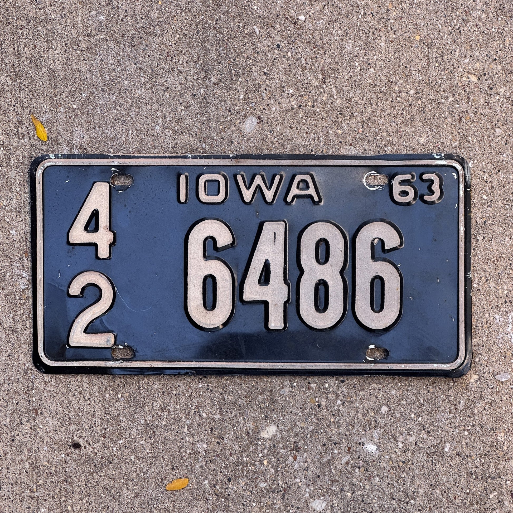 Photo of a 1963 Iowa License Plate Auto Tag Garage Decor Vintage 42 6486 with original patina