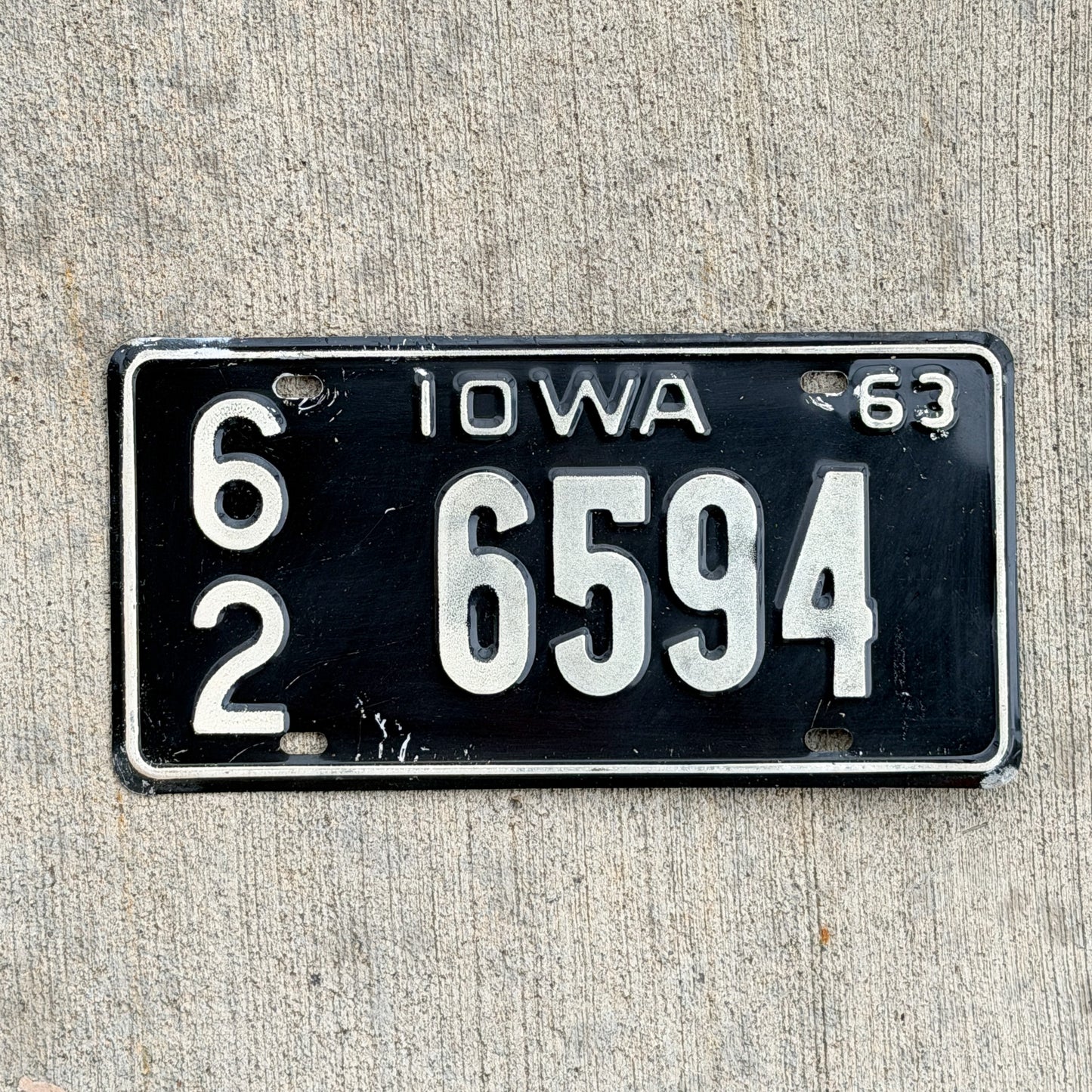 Photo of a 1963 Iowa License Plate Auto Tag Garage Decor Vintage 62 6594 with original patina